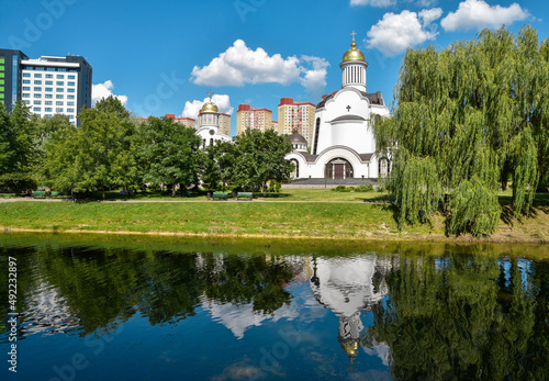 Transfiguration Orthodox Church and reflection in the water. Kyiv, Ukraine