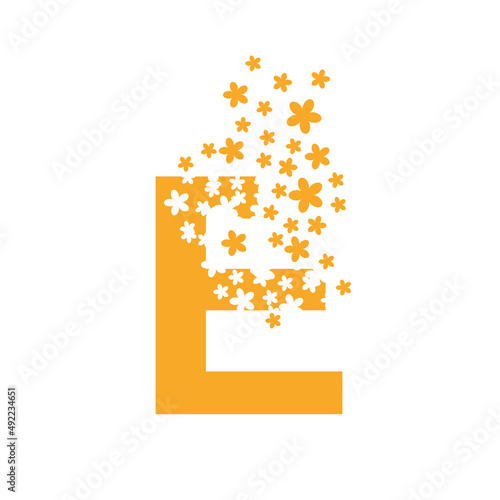 The letter E dissolves into a cloud of flowers