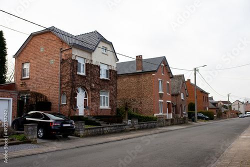 Fototapeta Naklejka Na Ścianę i Meble -  Europe Belgium village street. Brick houses. Travelling around Europe. Florelle, Namur