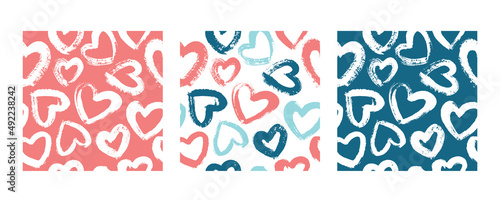 Set with 3 seamless patterns in red and blue colors. Vector backgrounds with hearts. Great for fabric, baby, Valentine's Day, scrapbook, surface textures.	