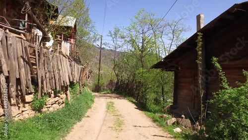 Wallpaper Mural A village street in Turkey. There are wooden houses in the green nature.. Torontodigital.ca