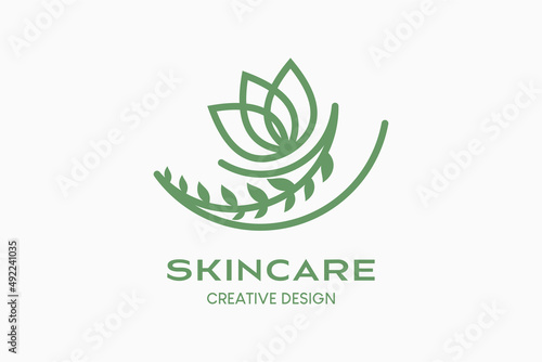 Skincare logo design with creative concept, flowers in line art style.