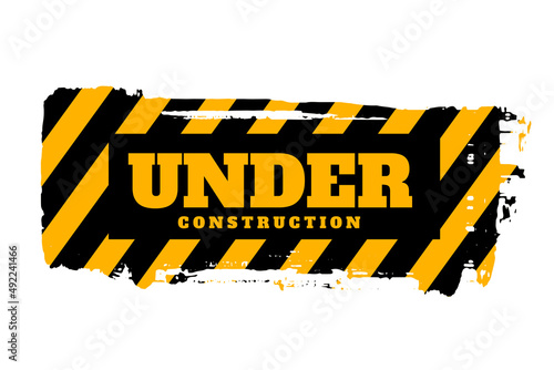 under construction yellow and black stripes background