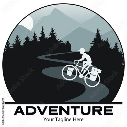 Rider cycling touring bike with bikepacking bags and tent on view of mountain. Vector and illustration emblem design.
