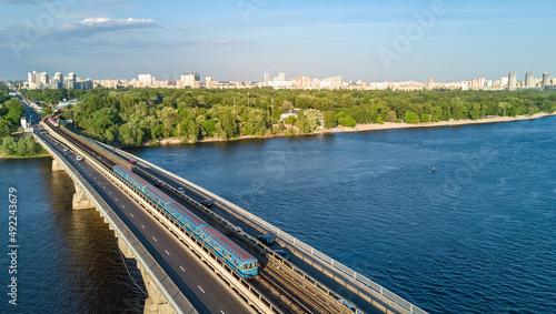 Wallpaper Mural Kyiv cityscape aerial drone view from above, Metro railway bridge with train and Dnieper river from above, skyline of city of Kiev and Dnipro, Ukraine Torontodigital.ca