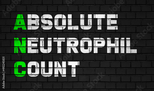 Absolute Neutrophil count(ANC) concept,healthcare abbreviations on black wall photo