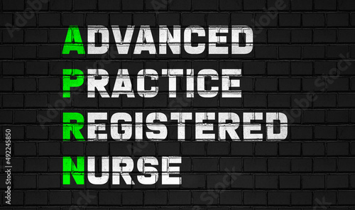 Advanced practice registered nurse(APRN) concept,healthcare abbreviations on black wall photo