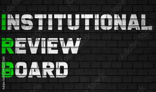 institutional review board(IRB) concept,healthcare abbreviations on black wall