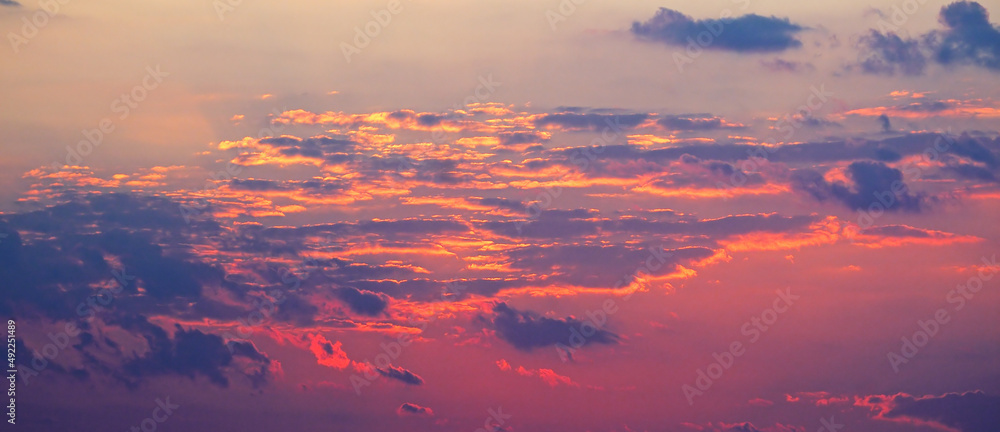 Dramatic sky with cloud at sunset. Wide photo. Dramatic sky with cloud at sunset. Wide photo.