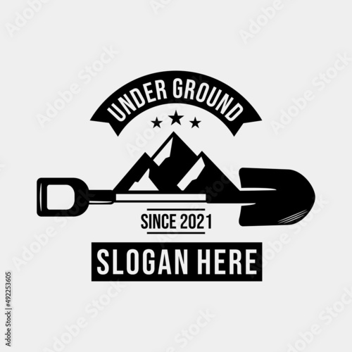 shovel with mountain vintage retro logo design