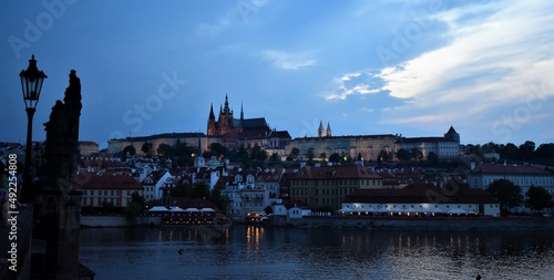 Prague castle view from city charles bridge in the evening