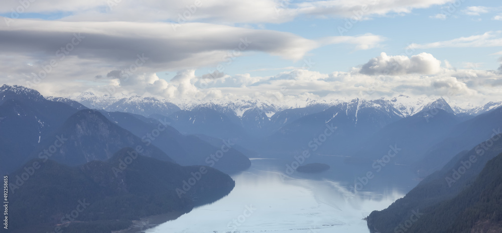 Aerial View of Pitt Lake with Canadian Mountain Landscape. Sunny Cloudy Sky Art Render. Pitt Meadows, Vancouver, British Columbia, Canada. Nature Background
