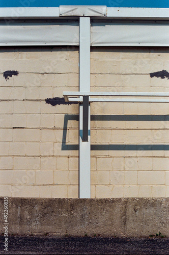 metal railing on the wall at noon