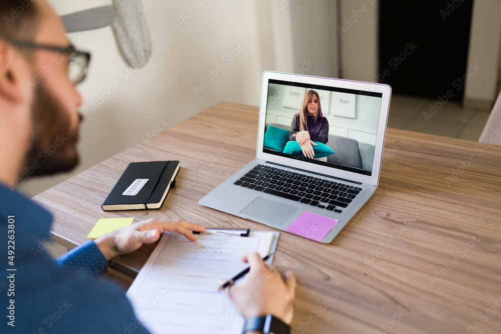 Psychologist talking with a patient online Psychologist talking with a patient online