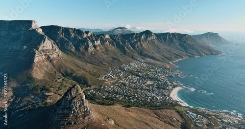Spectacular aerial view of Table Mountain,Lion's Head mountain, The 12 Apostles mountain range,looking at Camps Bay, Bakoven, Llandudno, Cape Town, South Africa