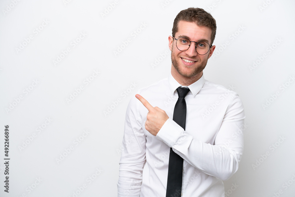 Young business caucasian man isolated on white background pointing to the side to present a product Young business caucasian man isolated on white background pointing to the side to present a product
