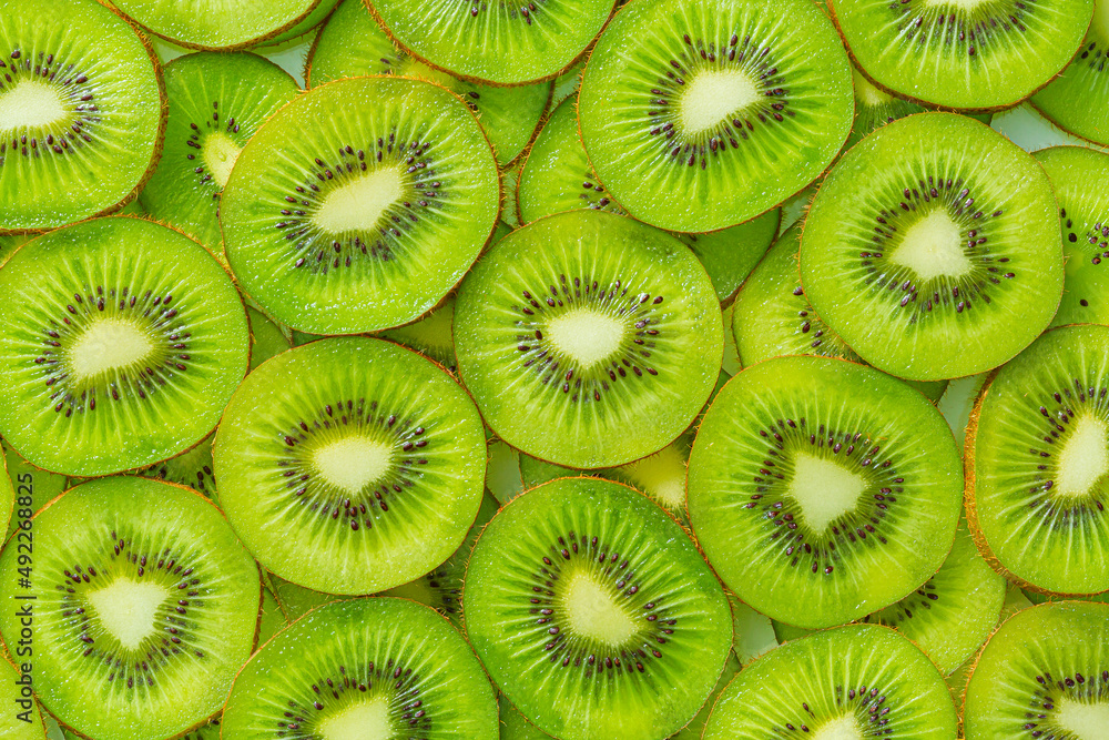 Kiwi Macro,Background of sliced kiwi layered, Kiwi Macro,Background of sliced kiwi layered,