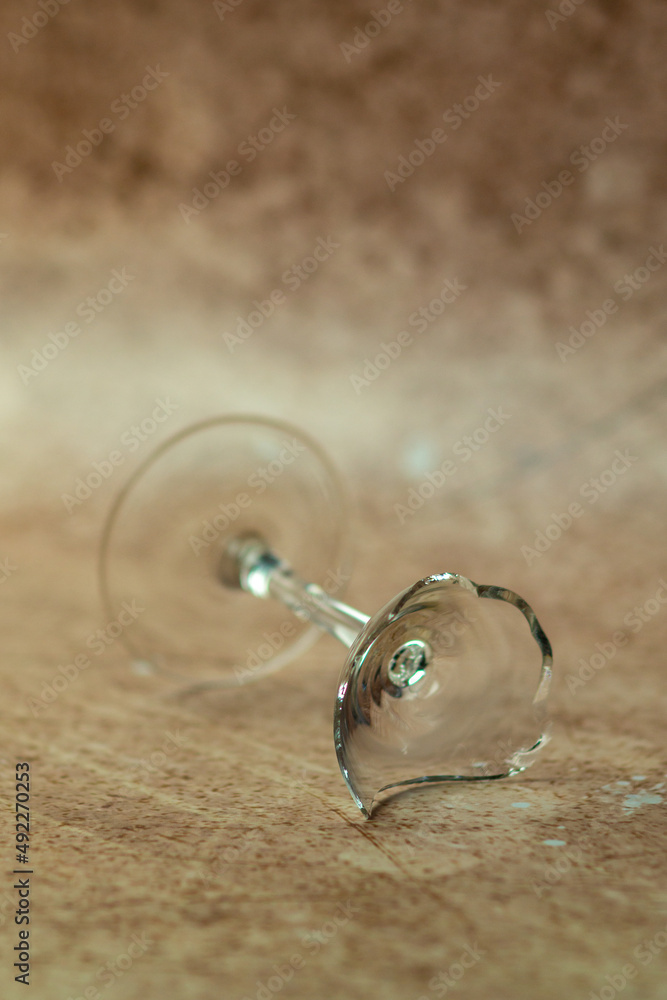 The foot of a broken wine glass is overturned 2