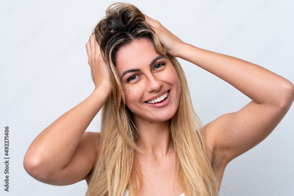 Young caucasian woman isolated on white background with happy expression. Close up portrait