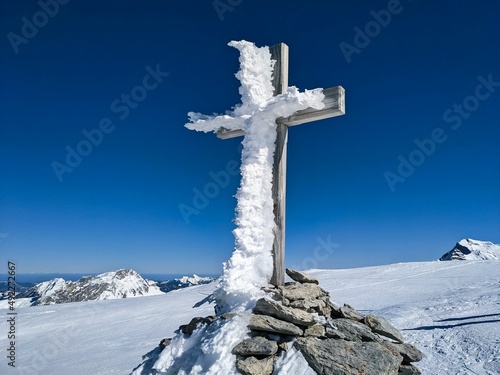 Winter peak crosses with a lot of snow and ice. snow cross. summit crossed on the mountain silberen. Ski mountaineering.
