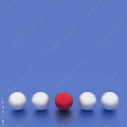 Individuality, unique and different red ball and other white. Contrast concepts with blank background © Alex