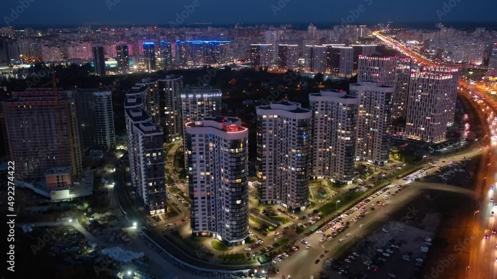 Megapolis. Modern houses in the city of Kyiv. Ukraine. Night. Aerial. Megapolis. Modern houses in the city of Kyiv. Ukraine. Night. Aerial.