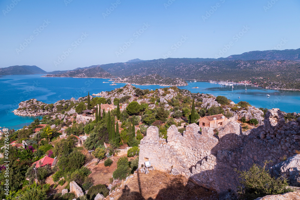 The village of Kalekoy in the centre near Kekova island in the Antalya Province of Turkey
