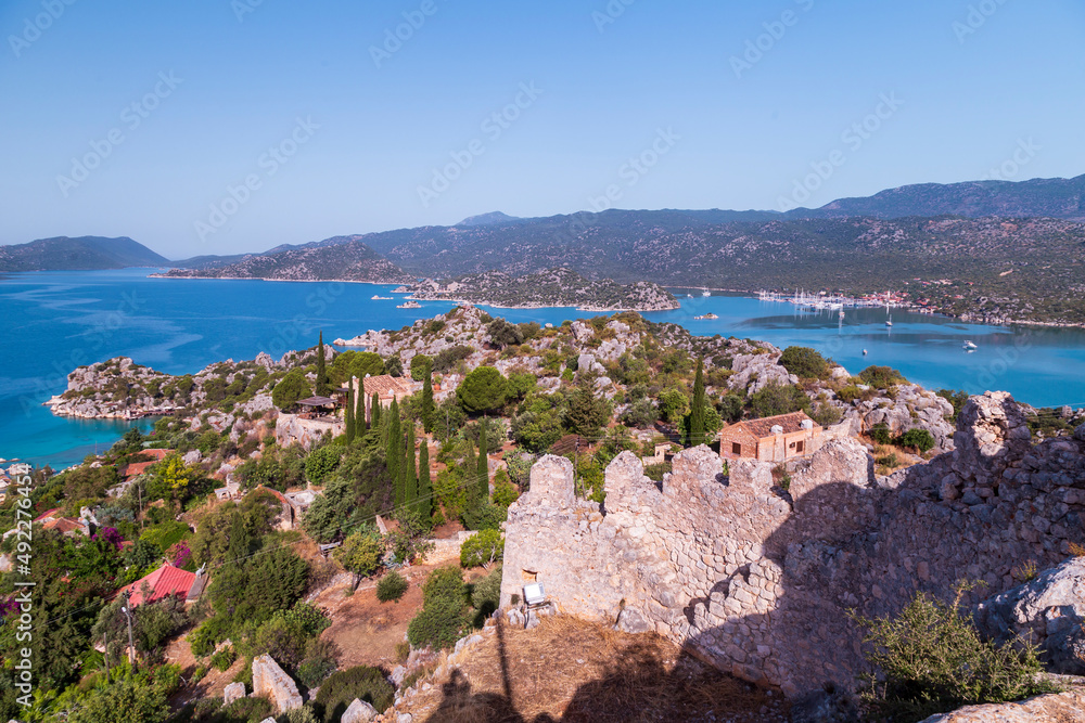The village of Kalekoy in the centre near Kekova island in the Antalya Province of Turkey The village of Kalekoy in the centre near Kekova island in the Antalya Province of Turkey
