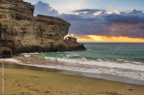 Looking out towards the ocean from the green sand of  Papakolea Beach on the big island of Hawaii. photo