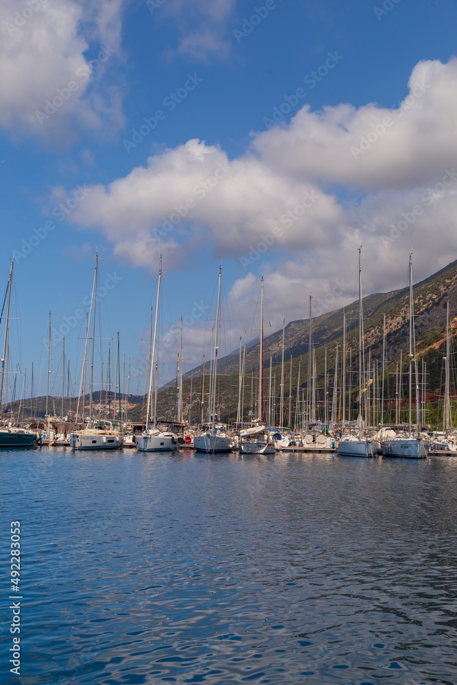 beautiful harbour view with the boats in Kas marina of Turkey. Blue sky and turquoise sea beautiful harbour view with the boats in Kas marina of Turkey. Blue sky and turquoise sea