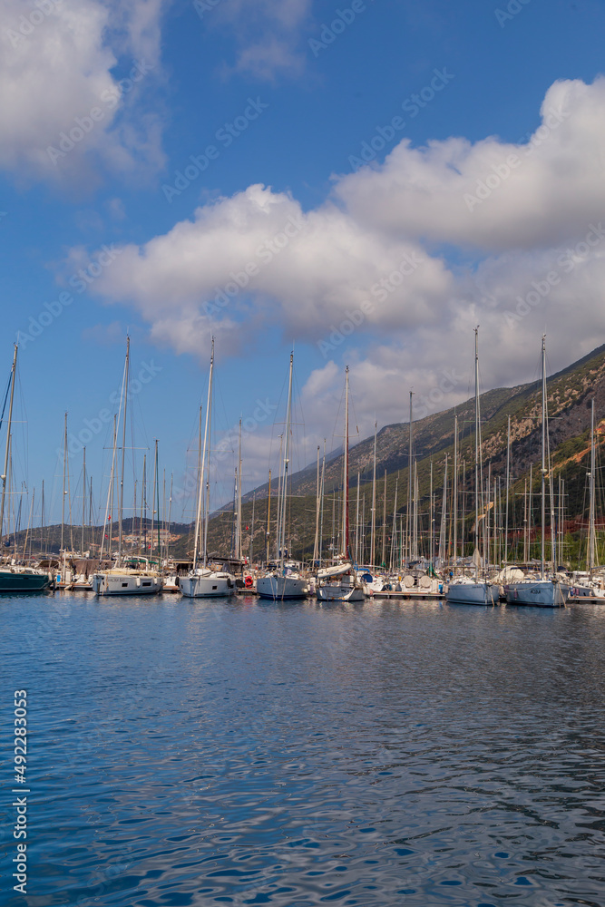 beautiful harbour view with the boats in Kas marina of Turkey. Blue sky and turquoise sea