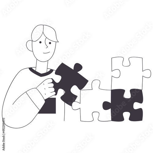 man is putting together a complex puzzle