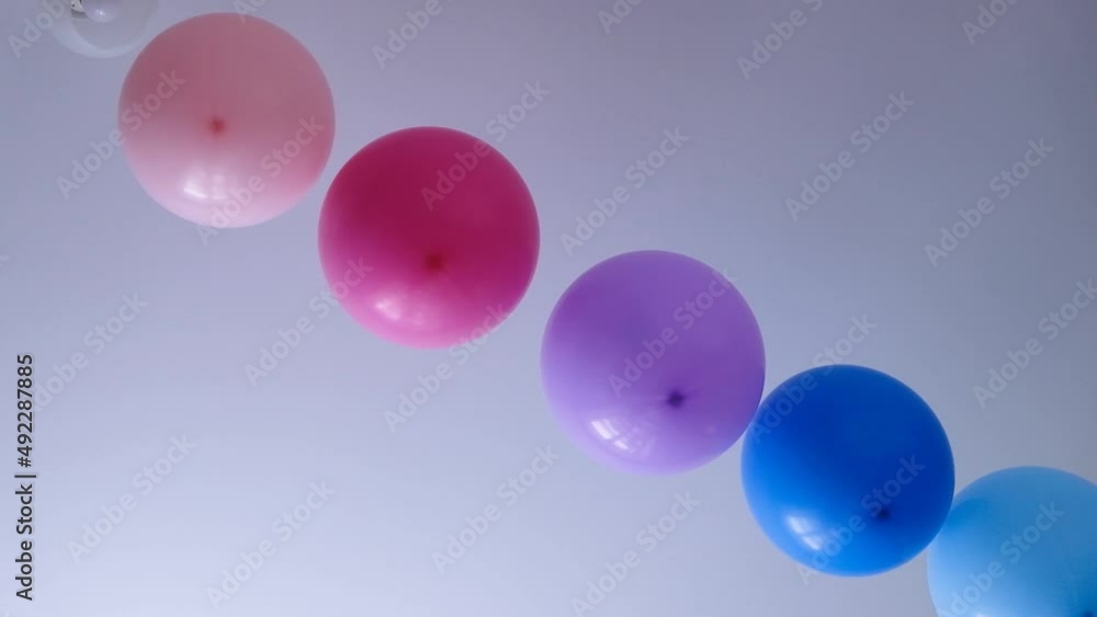 Rainbow balloons decorations for birthday party. Pride word. LGBT rights and gender equality Rainbow balloons decorations for birthday party. Pride word. LGBT rights and gender equality
