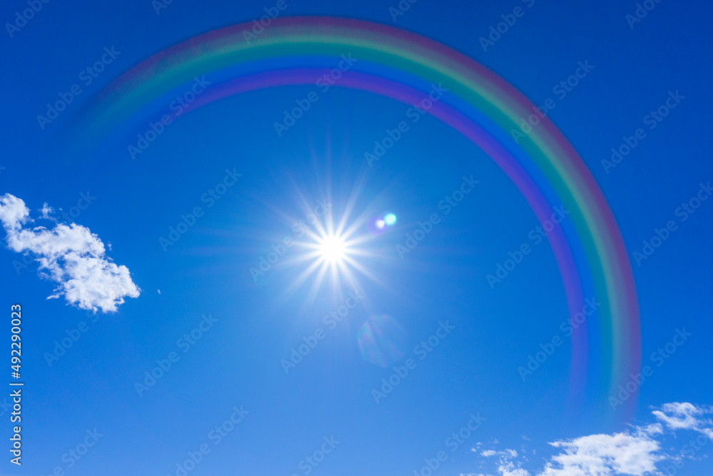 Bright blue sky with rainbow and sunshine_blue_12 Bright blue sky with rainbow and sunshine_blue_12
