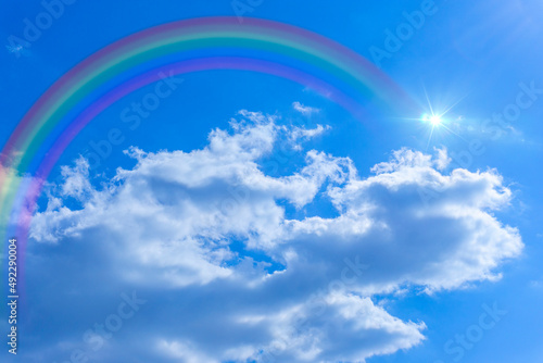 Bright blue sky with rainbow and sunshine_blue_05