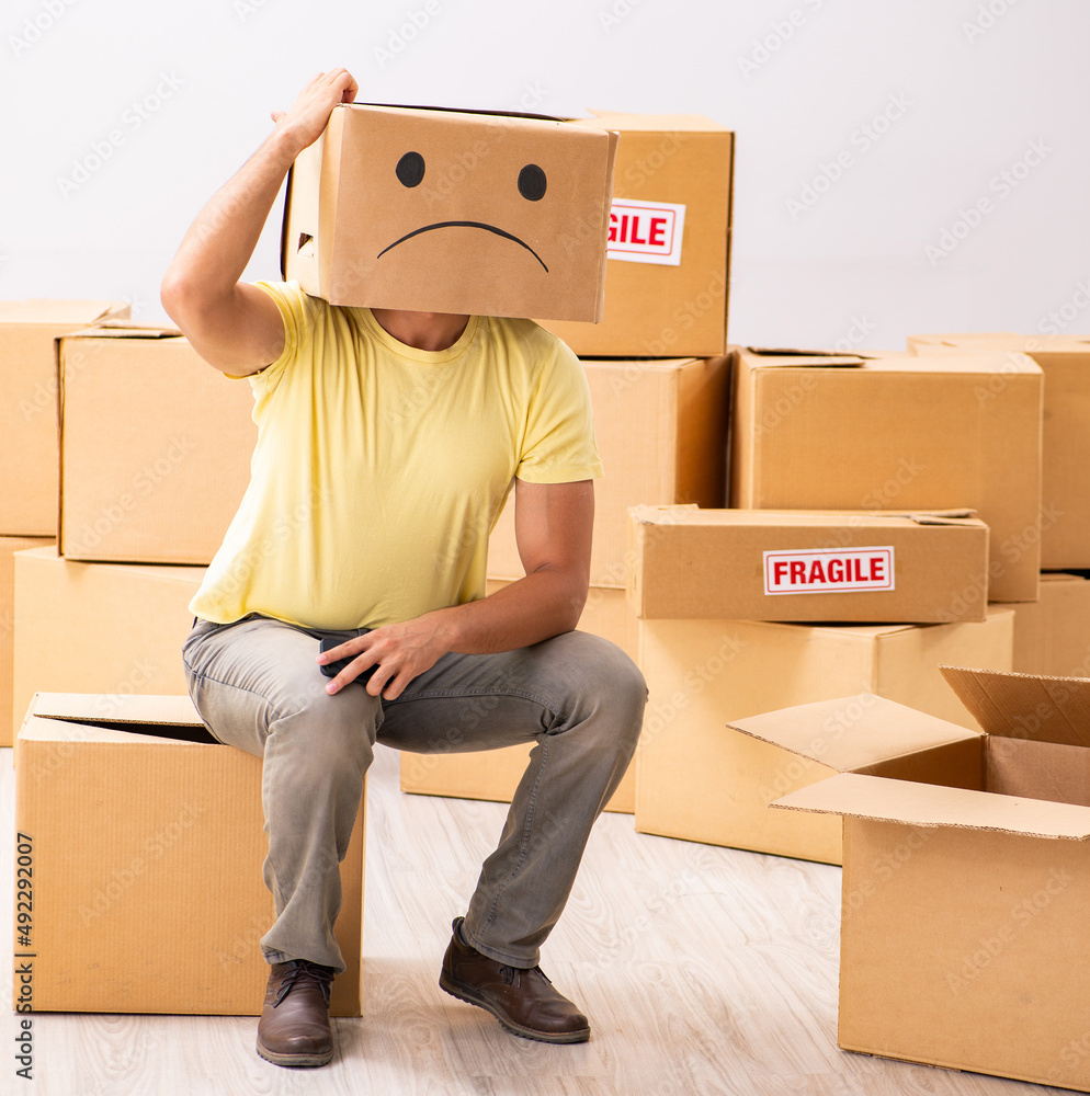 The unhappy man with box instead of his head The unhappy man with box instead of his head