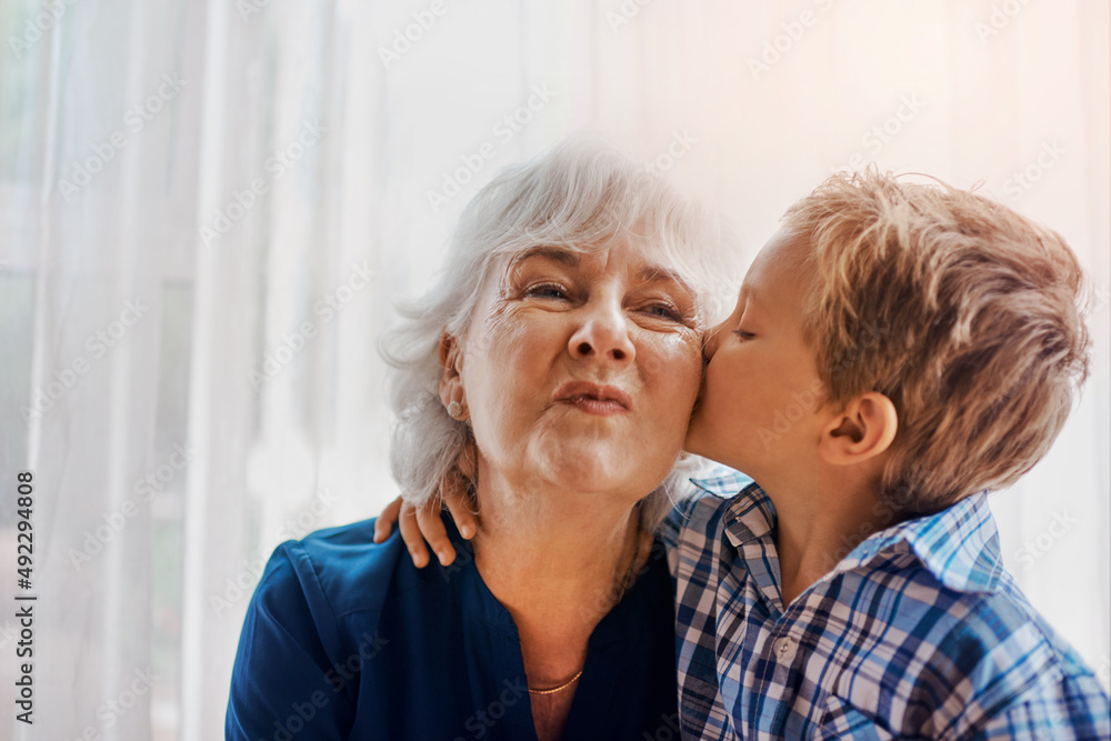 Hes the sweetest little boy. Cropped shot of a senior woman spending time with her loving grandson. Hes the sweetest little boy. Cropped shot of a senior woman spending time with her loving grandson.