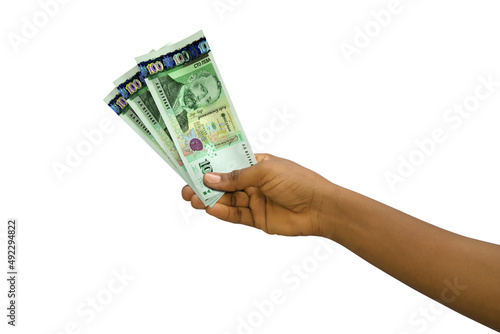 Fair hand holding 3D rendered 100 Bulgarian lev notes isolated on white background