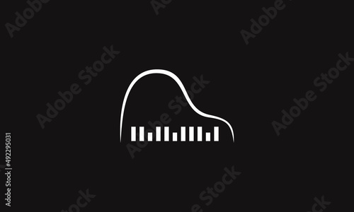 vector graphic illustration logo design for simple pictogram music instrument piano in a dark background