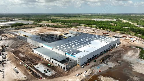 Aerial drone footage warehouse distribution center under construction Port St Lucie Florida photo