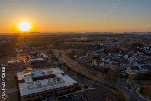 Low level aerial view of Urbana, Frederick County, Maryland at sunset.	 photo