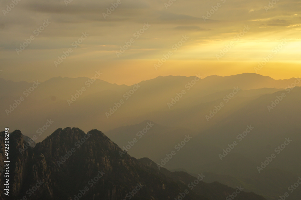 Obraz premium Landscape of Huangshan (Yellow Mountain). UNESCO World Heritage Site. Located in Huangshan, Anhui, China, tourist, silhouette sunset.