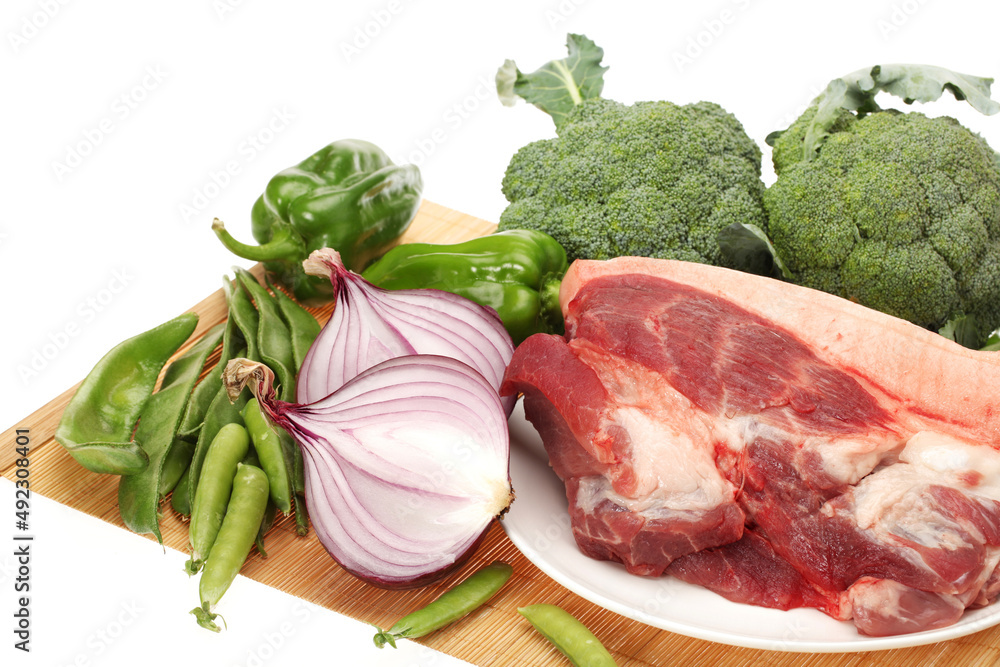 Fresh meat and Vegetables on white background Fresh meat and Vegetables on white background