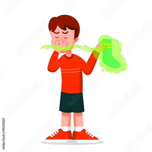 boy covers his nose while holding a foul smelling sock