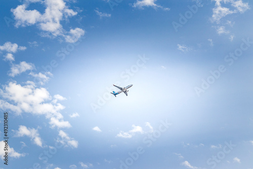Dubai, UAE - 02.27.2022 - Dubai, UAE - Shot of an Fly Dubai airlines airplane on blue sky background. Aviation