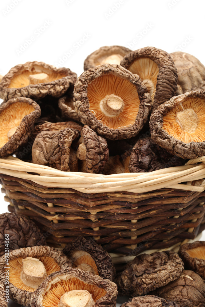 Dry Mushrooms isolated on white background. Selective focus Dry Mushrooms isolated on white background. Selective focus
