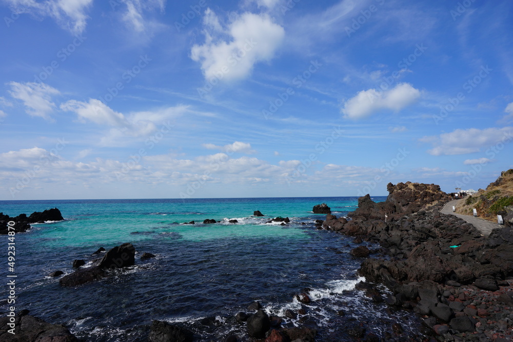 turquoise seascape with charming clouds