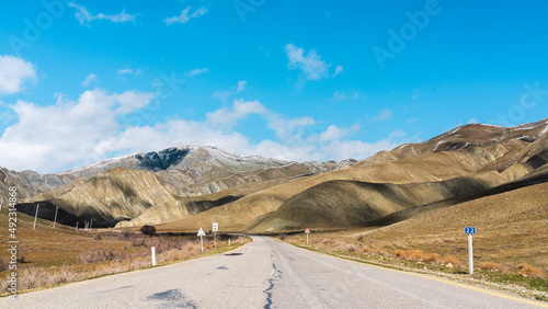 Winding asphalt road in a mountainous area