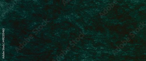 Abstract black and green background with black texture grunge in marbled vintage pattern with faint texture and distressed vintage grunge and watercolor paint stains.