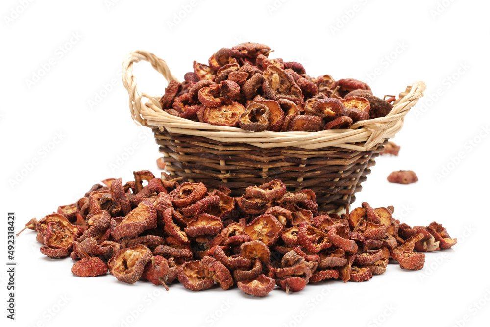Dried hawthorn slices for brewing tea on white background Dried hawthorn slices for brewing tea on white background